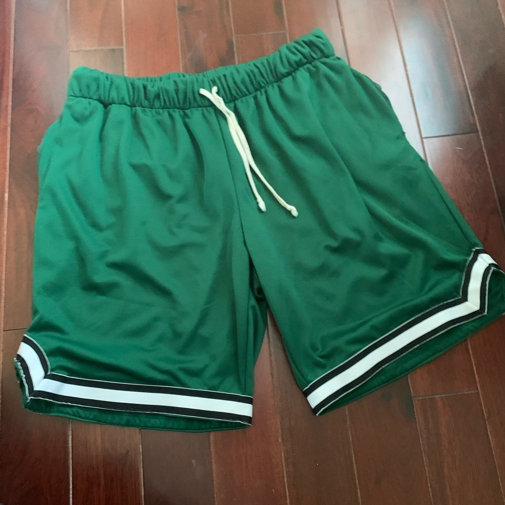 Green shorts with adjustable waist